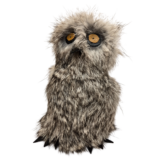 A grey and brown rabbit fur ookpik owl crafted by Inuk artist Daisy Savard.