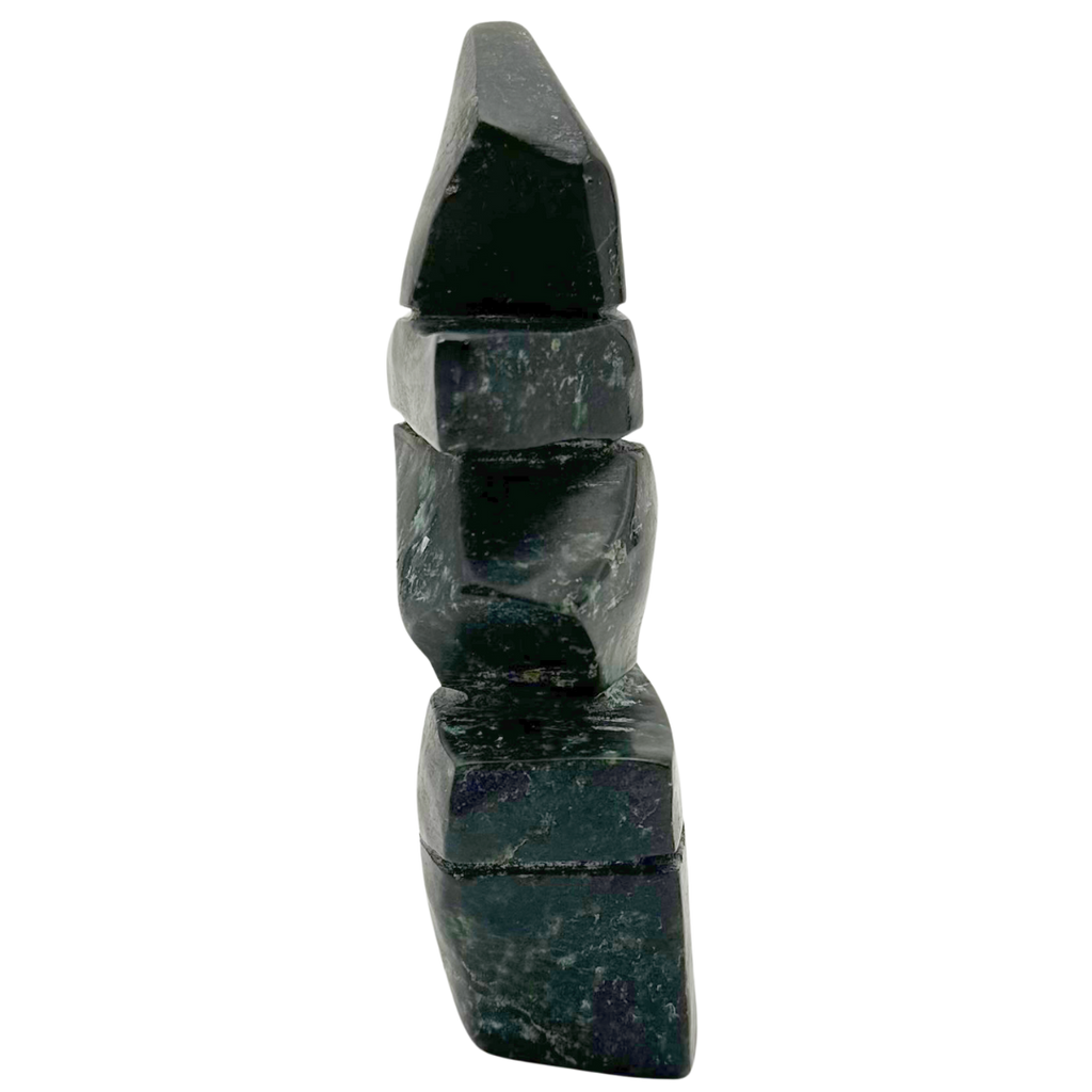 A two-toned green soapstone inukshuk by Arctic artist Gii Etungat.