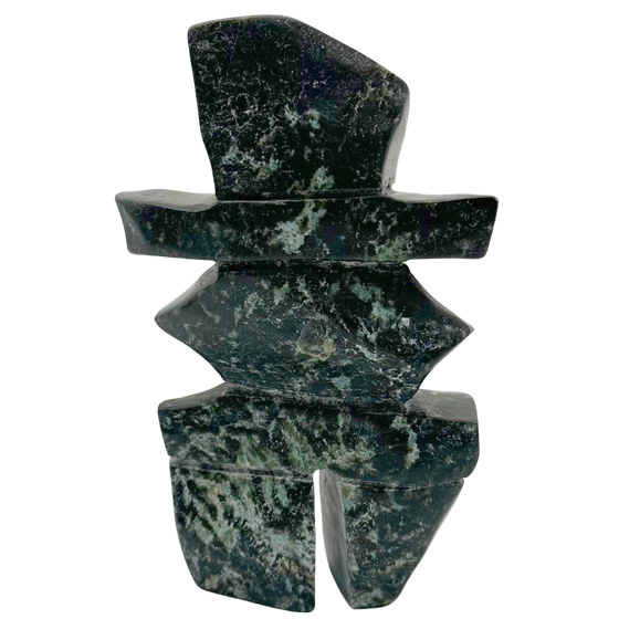 A two-toned green soapstone inukshuk by Arctic artist Gii Etungat.