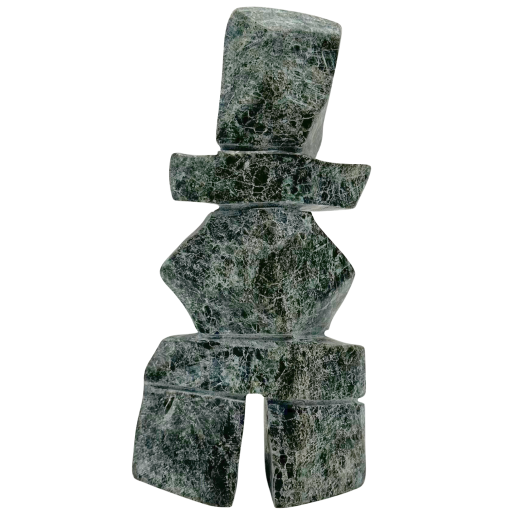 A two-toned green soapstone inukshuk by Arctic artist Gii Etungat.