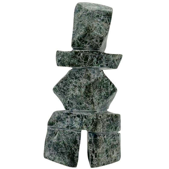 A two-toned green soapstone inukshuk by Arctic artist Gii Etungat.