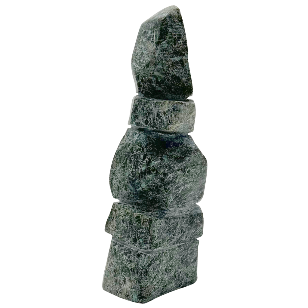 A two-toned green soapstone inukshuk by Arctic artist Gii Etungat.