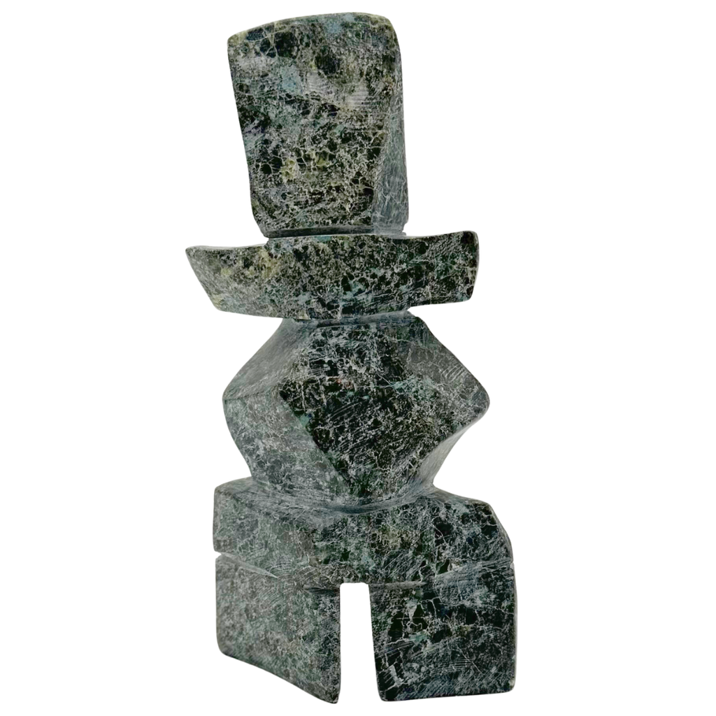 A two-toned green soapstone inukshuk by Arctic artist Gii Etungat.