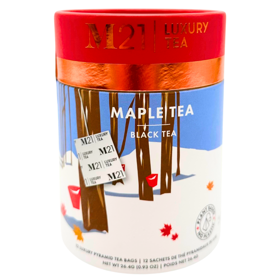 A cylindrical box that holds twelve maple flavoured tea bags. The tea bags are pyramid shaped and are blended and packed in Canada. The container is made from 100% recycled paper. The illustration on the canister depicts a Canadian winter forest scene with maple trees. Red buckets hang from the trees representing the maple syrup harvest and maple leaves scatter the ground.  The red imagery matches the red coloured lid. It includes instructions to brew for three to five minutes. 