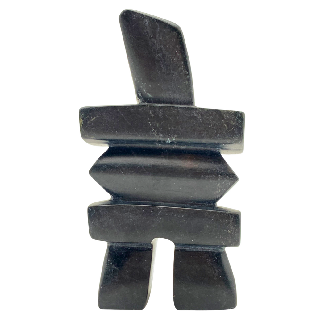 A human-shaped inukshuk sculpture, approximately 5 inches. The soapstone is black with green marbling.