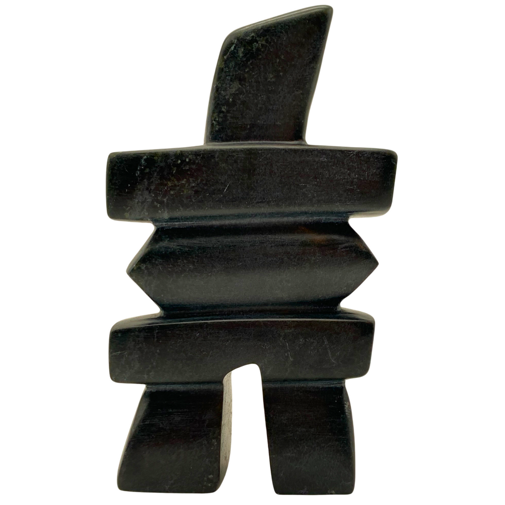 A human-shaped inukshuk sculpture, approximately 5 inches. The soapstone is black with green marbling.