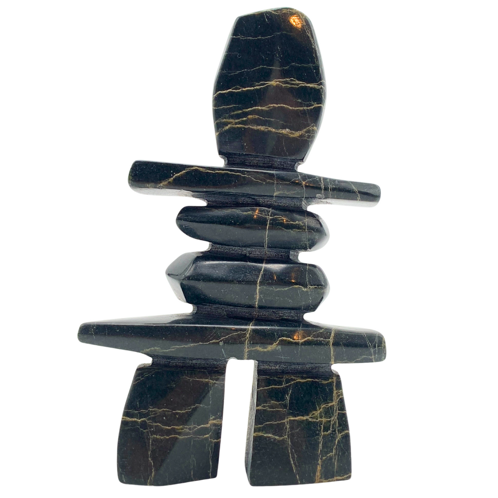 A human-shaped inukshuk sculpture, approximately 5.5 inches high. The soapstone is black with vivid gold lines streaking through it.