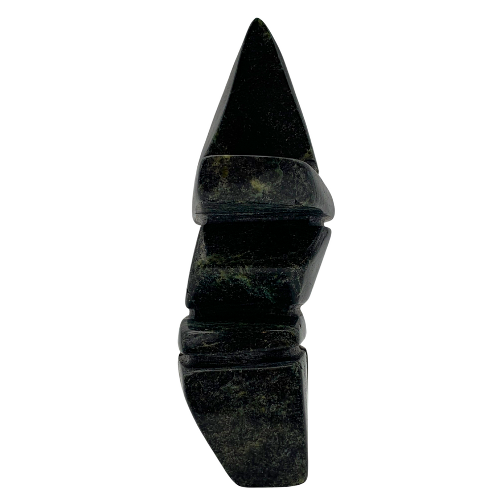 A human-shaped inukshuk sculpture, approximately 5 inches high. The stone is mottled black and green soapstone.