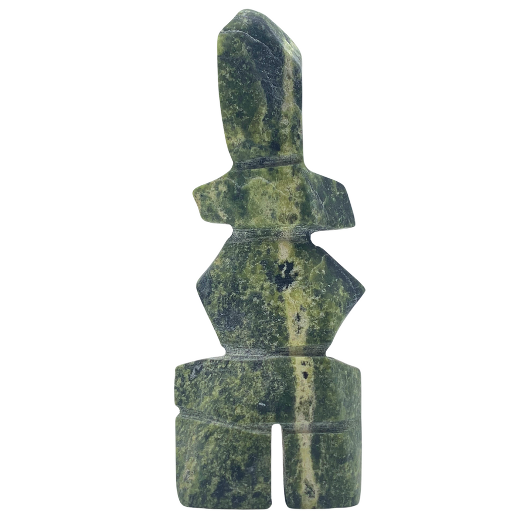 A human-shaped inukshuk sculpture, approximately 4.5 inches high with a bright green stripe running down one side. The stone is mottled black and green soapstone.