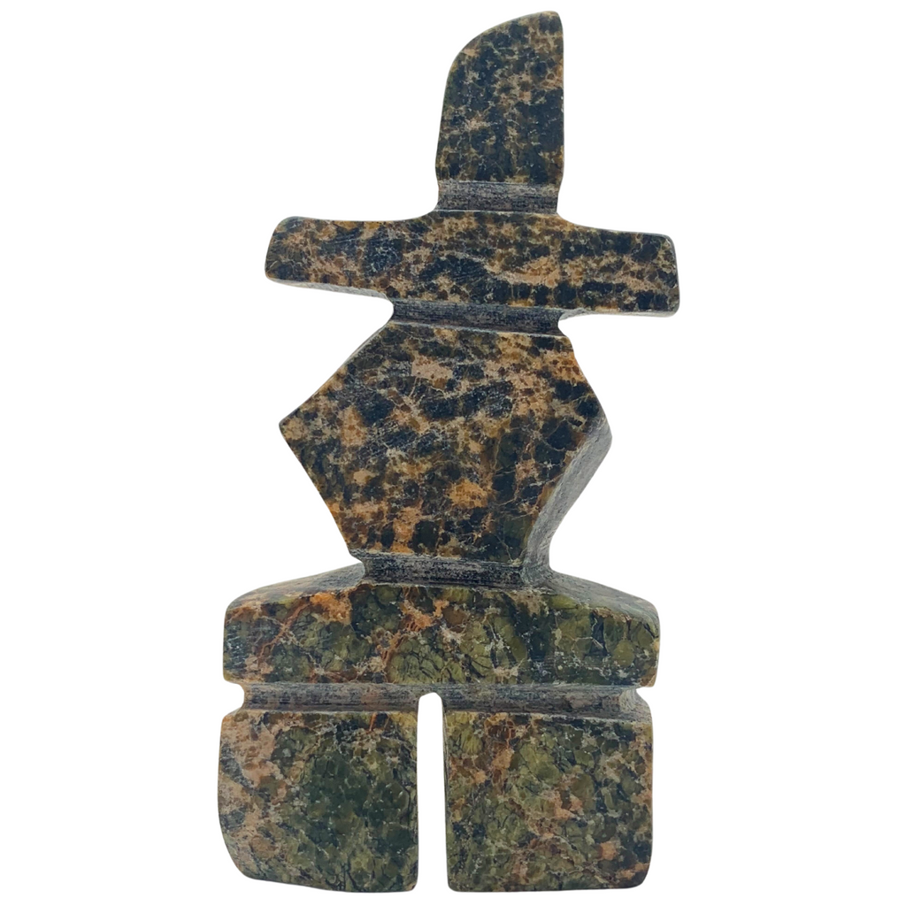 A human-shaped inukshuk sculpture, approximately 3.5 inches high. The stone is mottled black, brown and green soapstone.