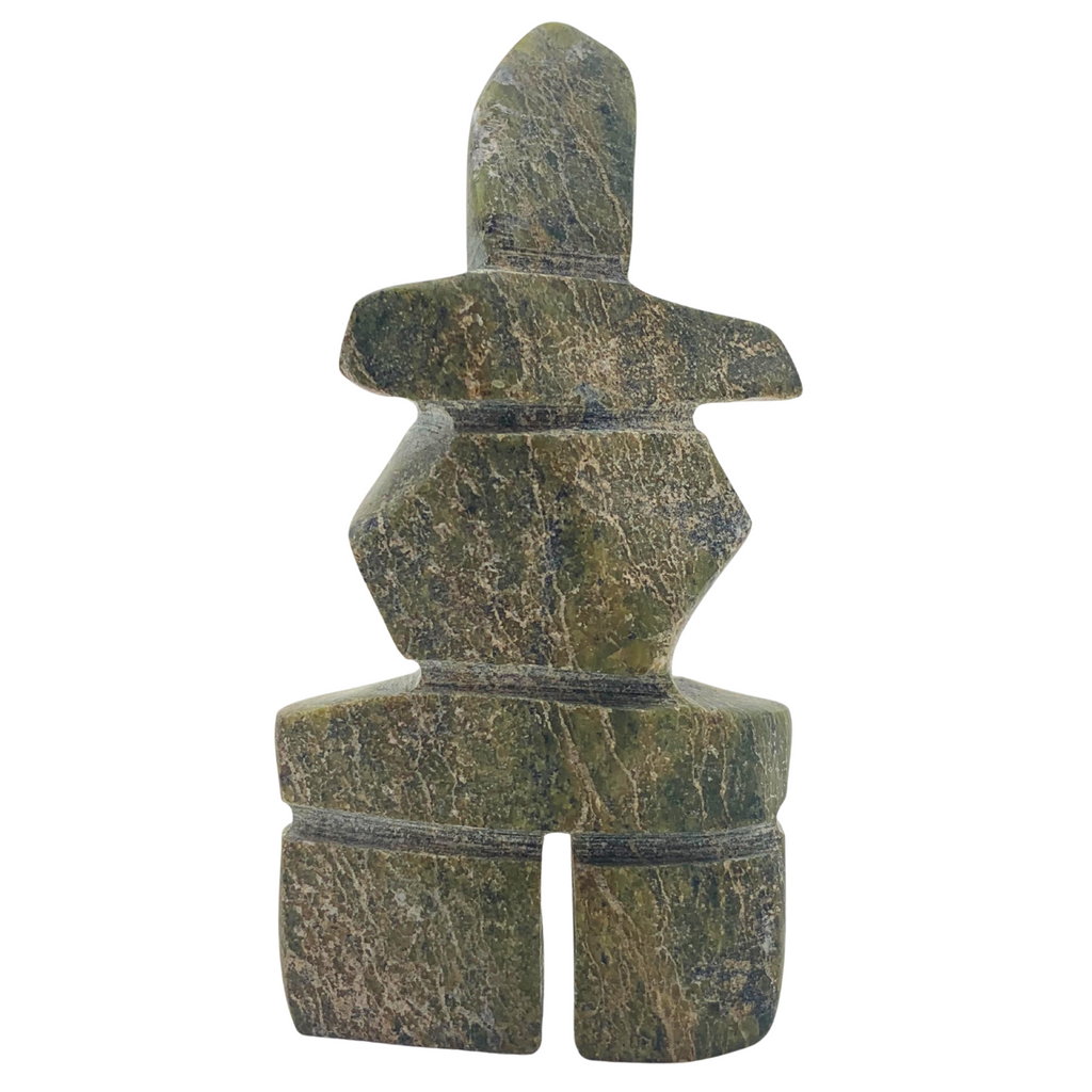 A human-shaped inukshuk sculpture, approximately 3 inches high. The stone is mottled black and green soapstone.