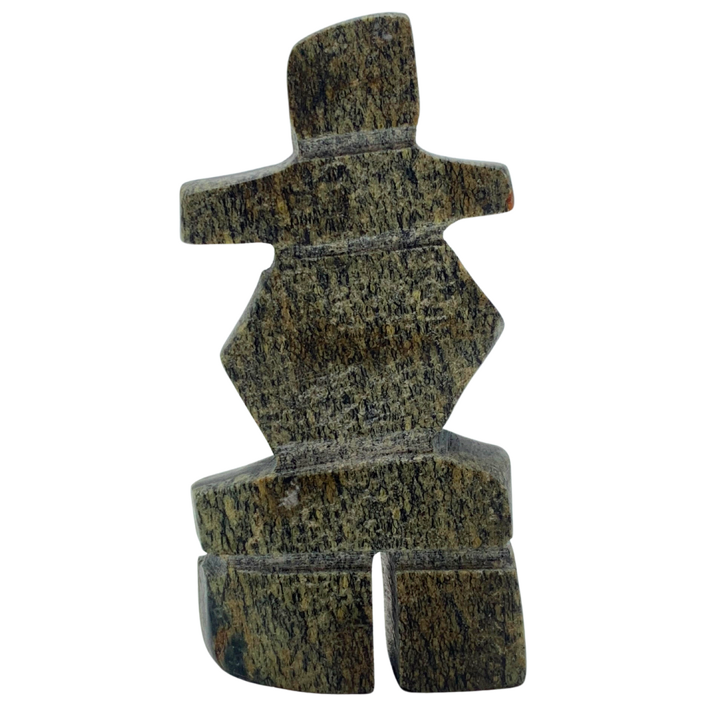 A human-shaped stone sculpture, approximately 3 inches high. The stone is black and brown.