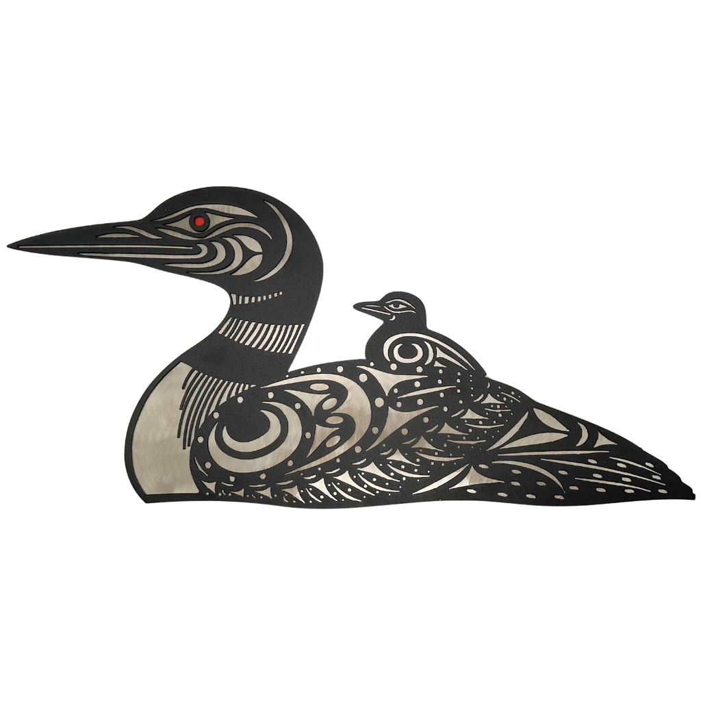 This metal sculpture shows the matte black silhouette of a red-eyed loon with its baby sitting on its back. White-coloured metal shows the details of the loons' beaks, collars, and spotted feathers.