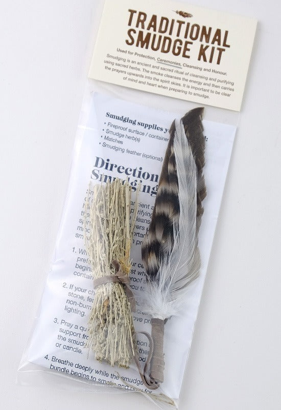 This kit contains a small bundle of dried sage and brown and white feather fan for a smudging ceremony, complete with directions.