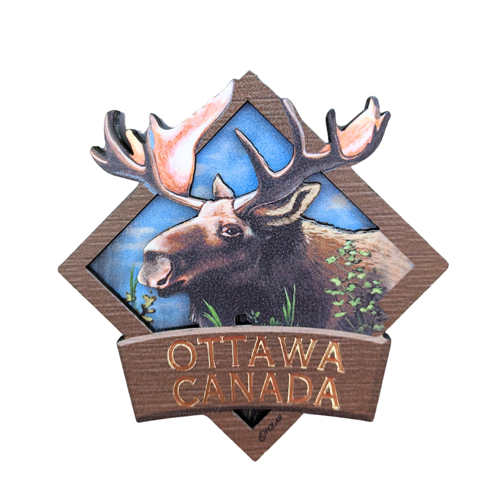 Cool brown bordered diamond shaped wooden magnet. Vibrant Canadian moose centered in a bright sky. The antlers embedded in the boarder above the moose. "Ottawa, Canada" in gold written underneath.