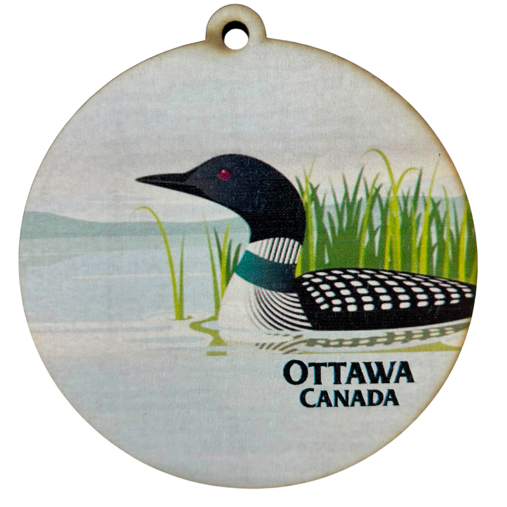 A common loon swims in the shallows in an iconic Canadian scene. At the bottom right reads "Ottawa Canada"