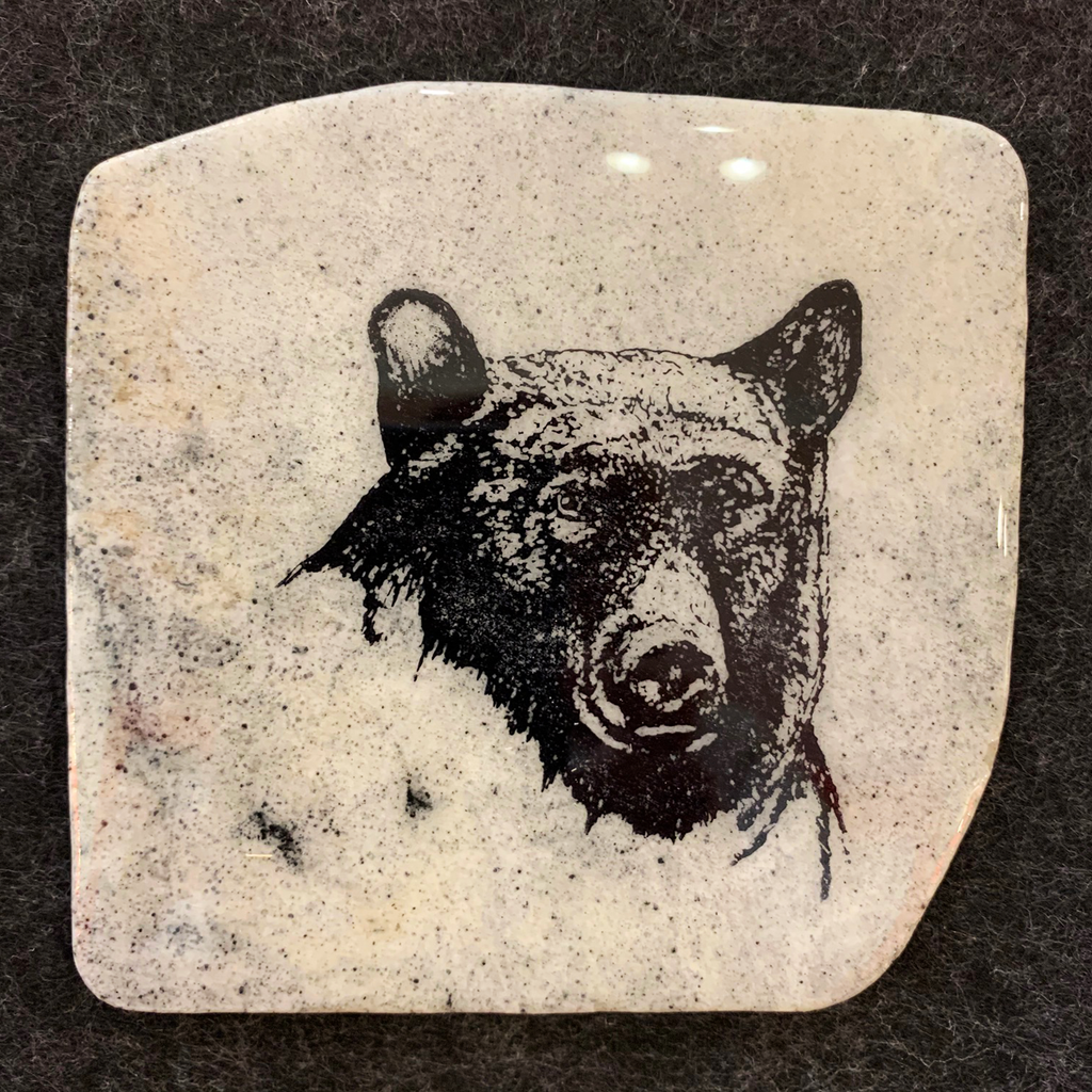 A second image of a black bear coaster.